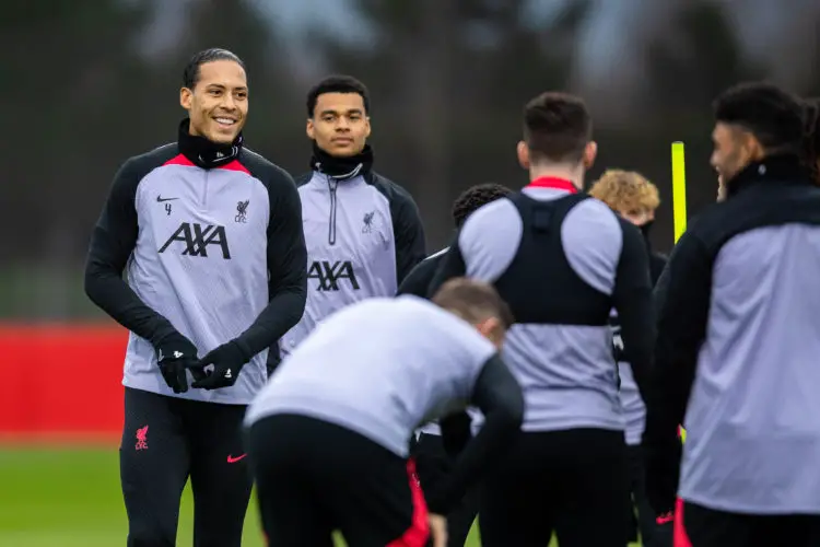Liverpool players have a laugh during their training session- Liverpool media