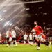 Manchester United beat 9-man Fulham to advance into semi- finals