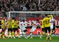 Bundesliga Roundup: Bayern, Dortmund slip as Leipzig holds on